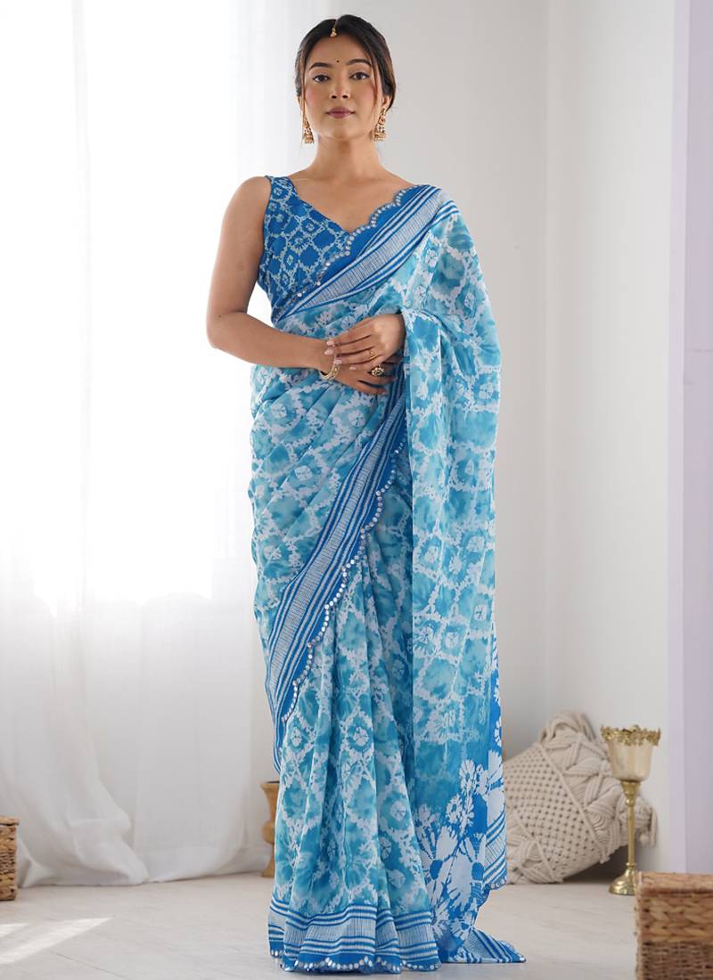 sky blue chinon silk blend print work with mirror work border designer saree