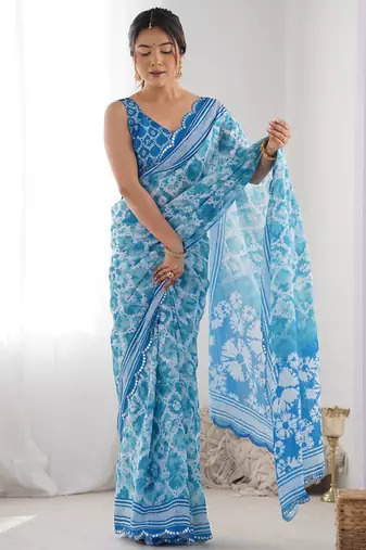 sky blue chinon silk blend print work with mirror work border designer saree