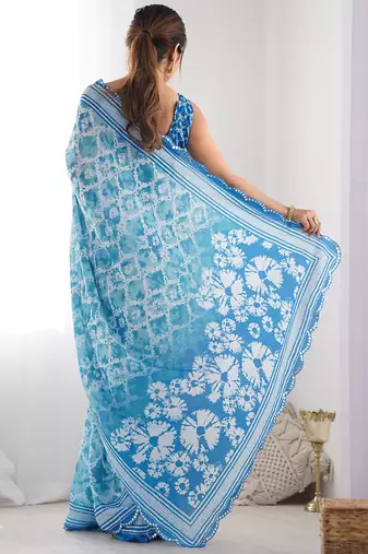 sky blue chinon silk blend print work with mirror work border designer saree