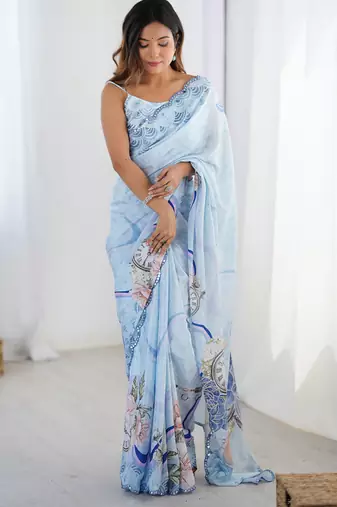 sky blue chinon silk blend print work with mirror work border designer saree