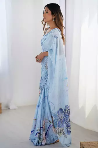 sky blue chinon silk blend print work with mirror work border designer saree