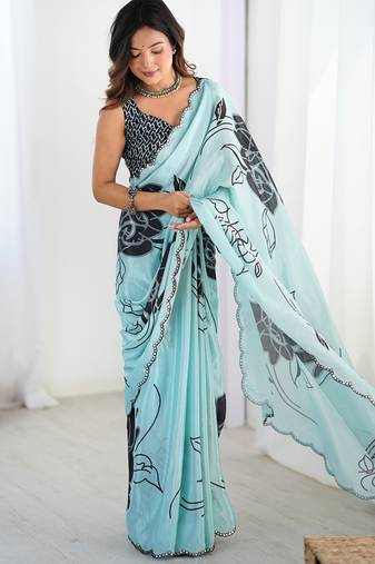 sky blue chinon silk blend print work with mirror work border designer saree