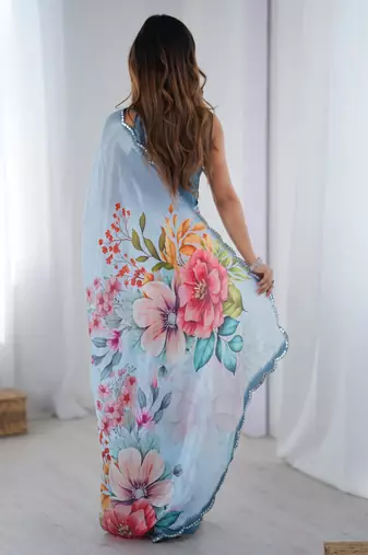 sky blue chinon silk blend print work with mirror work border designer saree