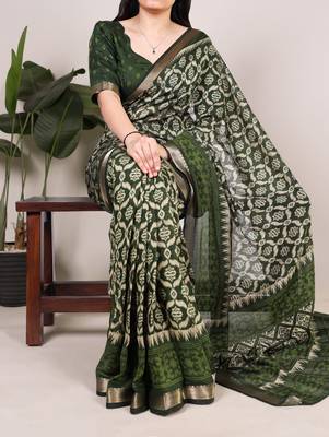 Polyester viscose chanderi ikat print saree with rich zari weaving border 1