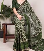 Polyester viscose chanderi ikat print saree with rich zari weaving border