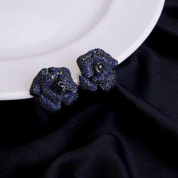 Eclipse gem floral studs in black plated 1