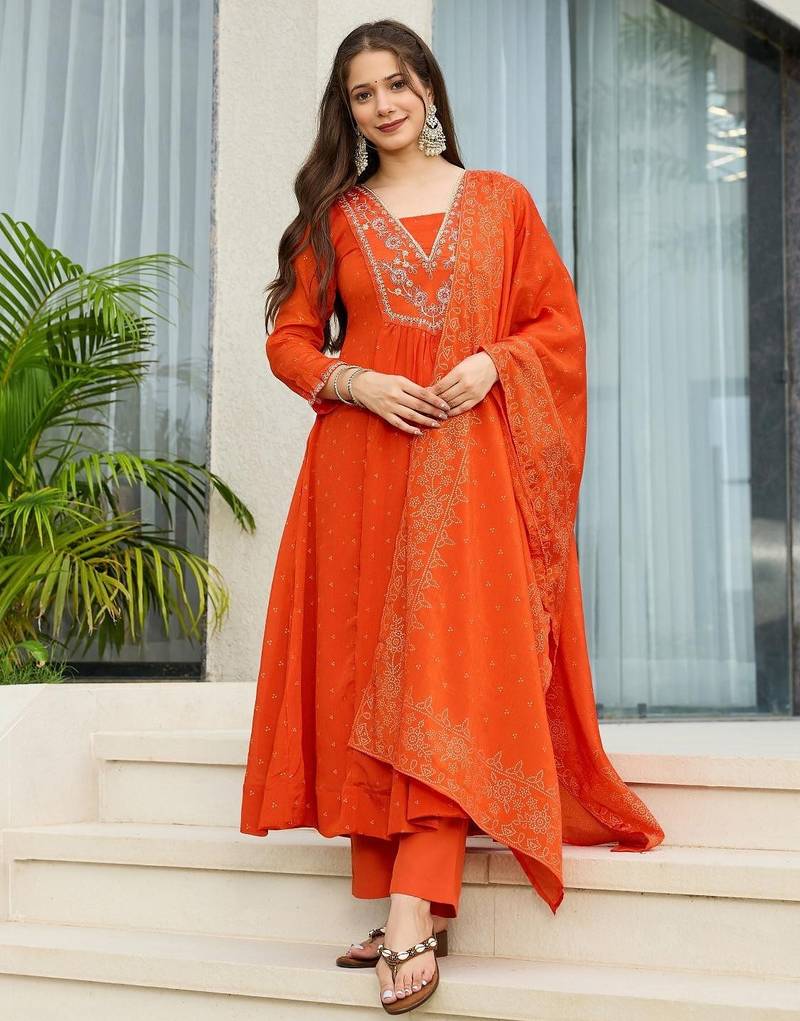Orange chinon embroidered flared kurta set.