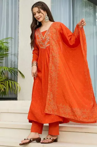 Orange chinon embroidered flared kurta set.