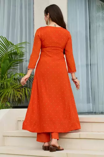 Orange chinon embroidered flared kurta set.