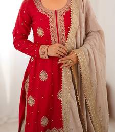Beige sharara set with intricate embroidery work