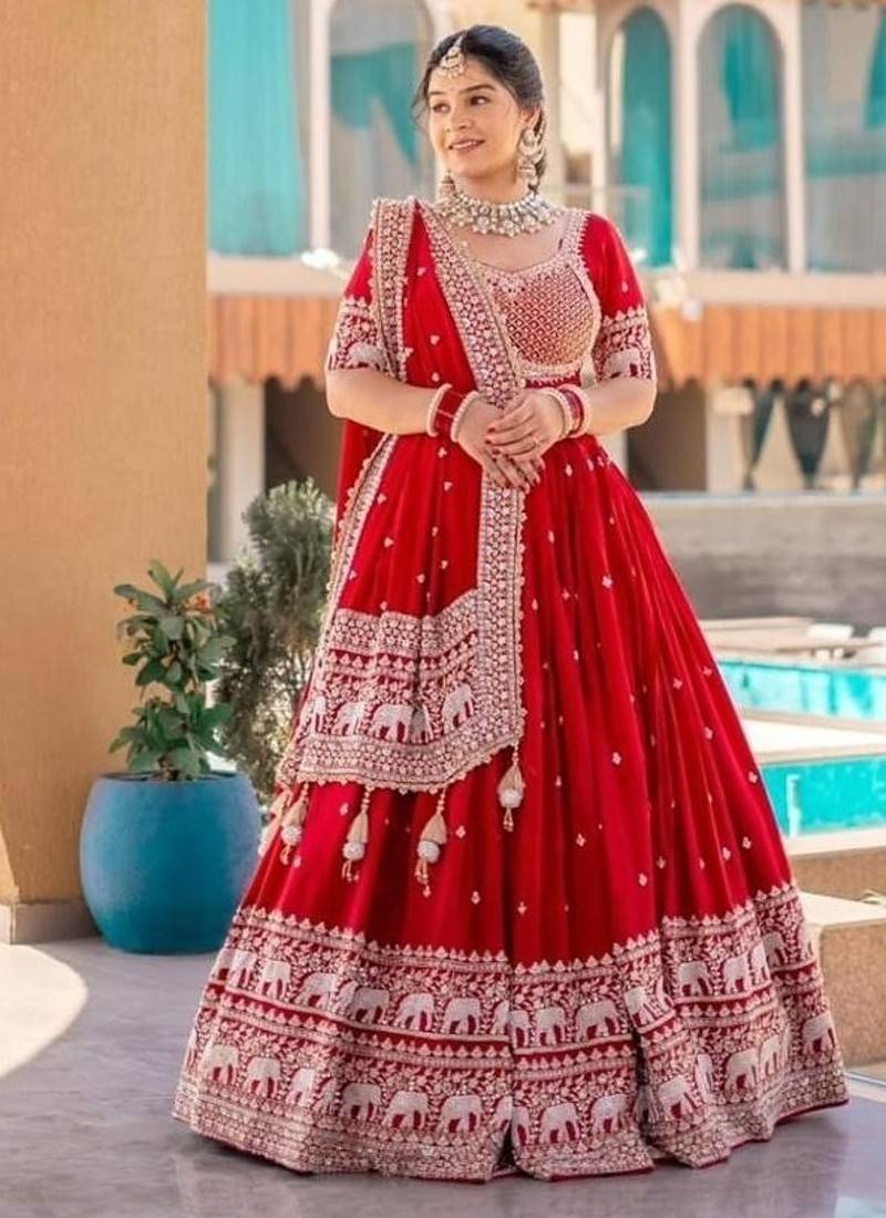 Red georgette lehenga choli with intricate embroidery work