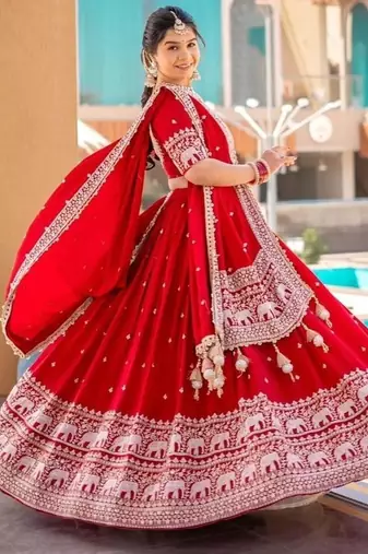 Red georgette lehenga choli with intricate embroidery work