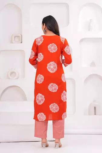 Orange printed tussel cotton kurta with trousers & with dupatta