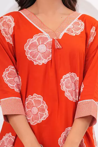 Orange printed tussel cotton kurta with trousers & with dupatta