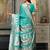 rama green color zari woven banarasi art silk saree