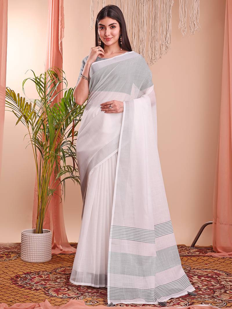 white color linen cotton zari border saree