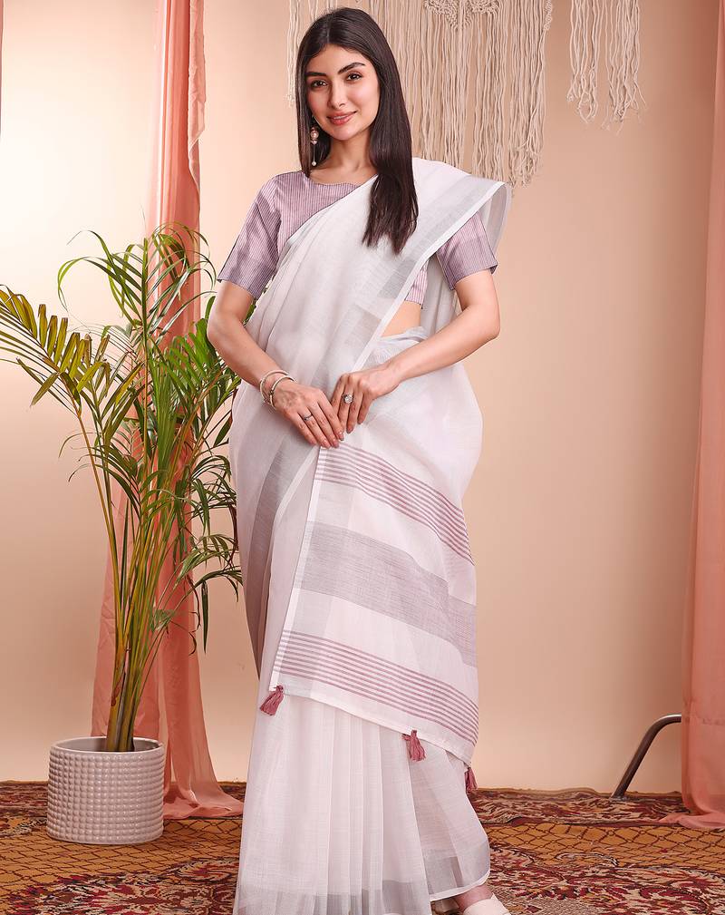 white color linen cotton zari border saree