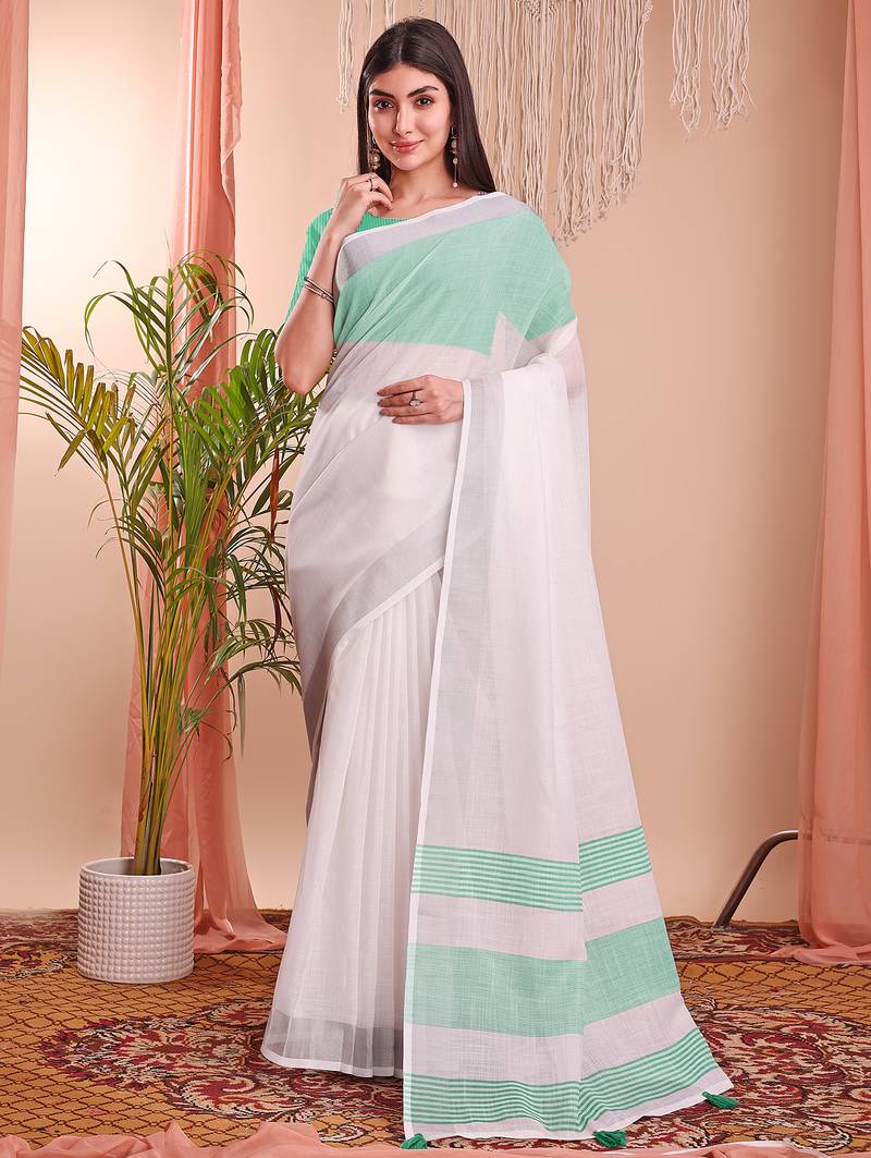 white color linen cotton zari border saree