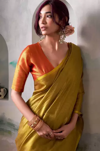 musturd solid tissue art silk blend tassels pallu saree