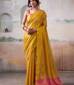 yellow solid tissue art silk tassels pallu saree
