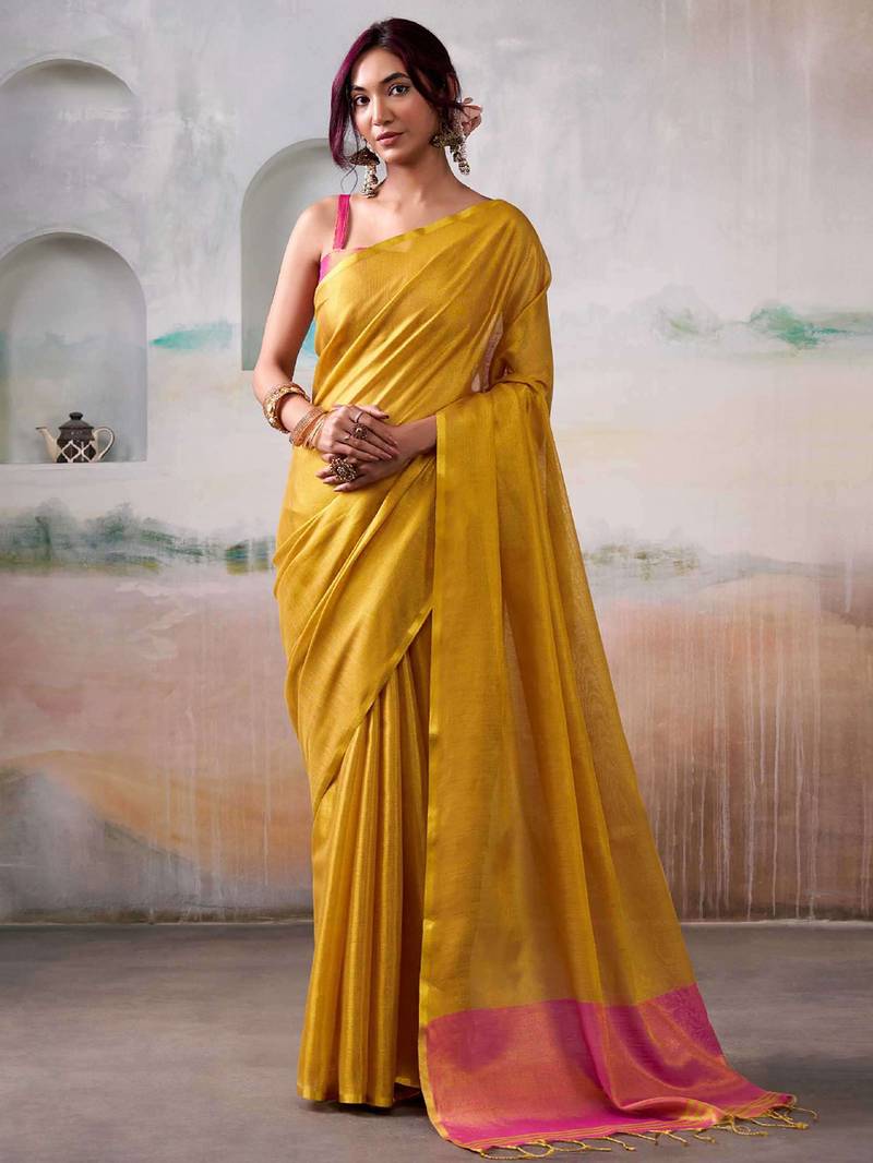 yellow solid tissue art silk tassels pallu saree