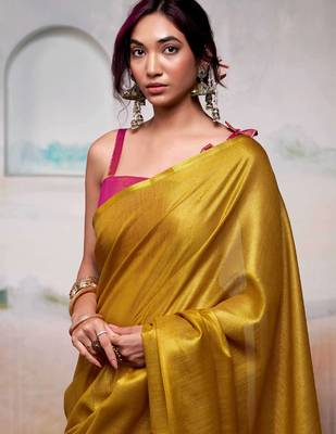yellow solid tissue art silk blend tassels pallu saree 2
