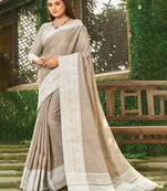 light brown solid with woven border linen saree
