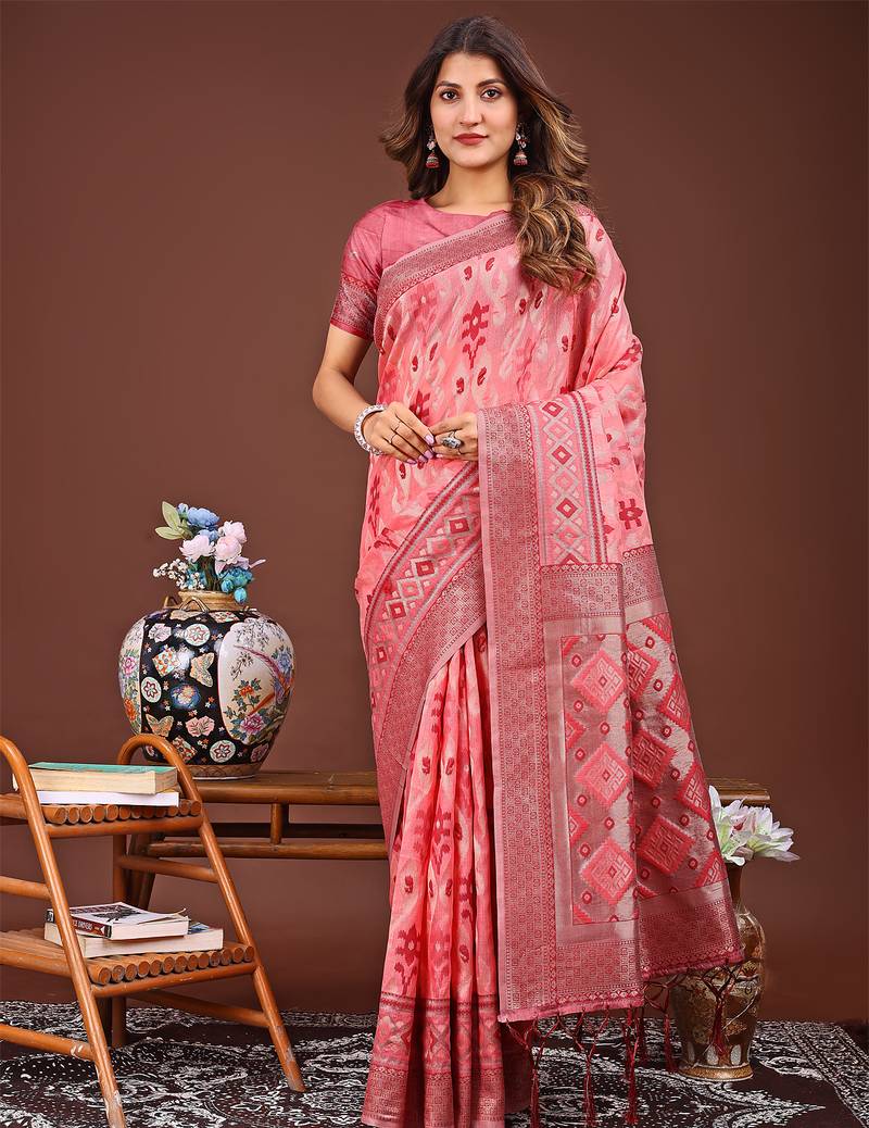 peach color embroidered linen cotton saree