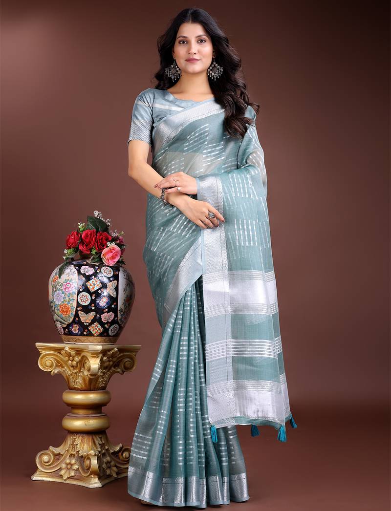 sea green color lining orgenza zari border saree