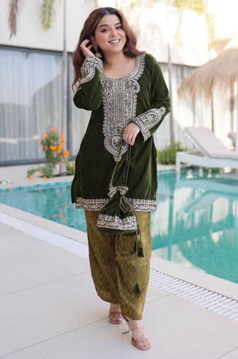 Green velvet zari embroidered and mirror work kurta with pant