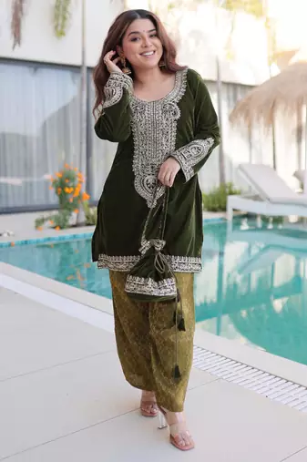 Green velvet zari embroidered and mirror work kurta with pant