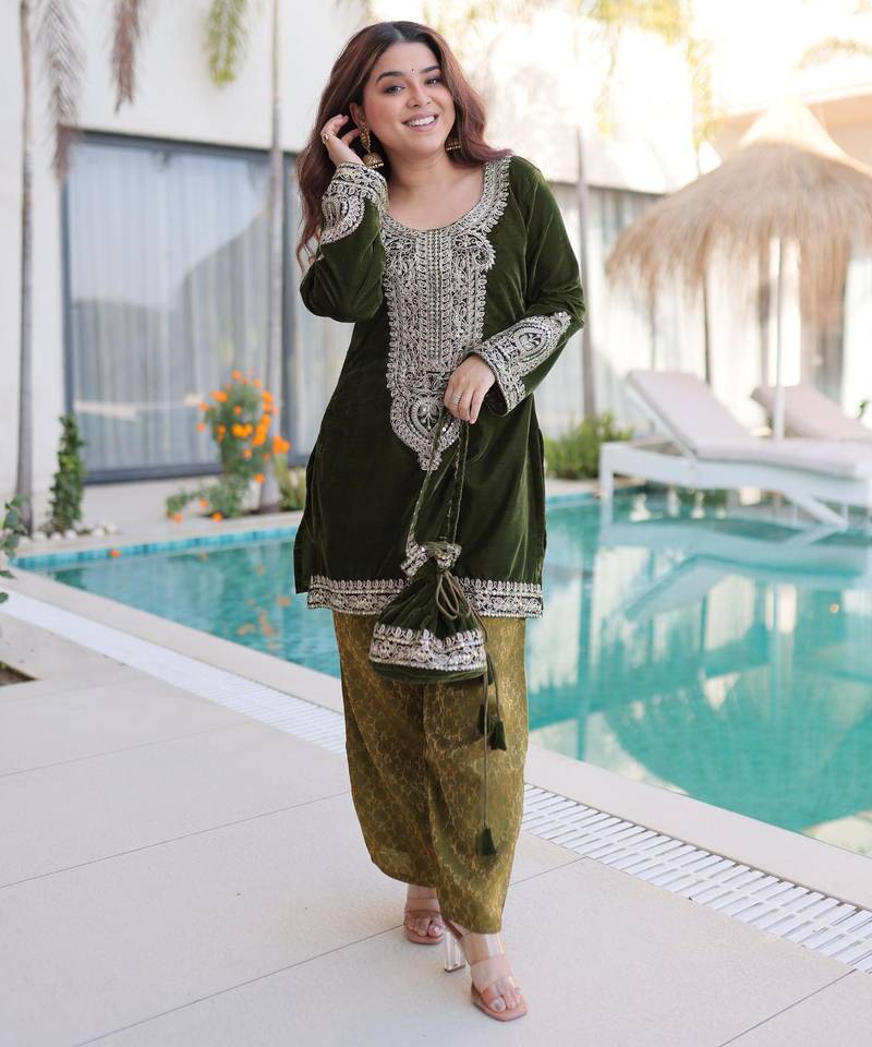 Green velvet zari embroidered and mirror work kurta with pant