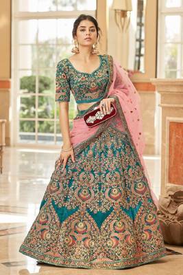 Alluring Teal Blue Thread Zari Dori And Sequins Embroidered Velvet Bridal Wear Lehenga Choli For Women 1
