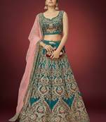 TURQUOISE THREAD ZARI DORI AND SEQUINS EMBROIDEREY WORK VELVET SEMI STITCHED LEHENGA CHOLI