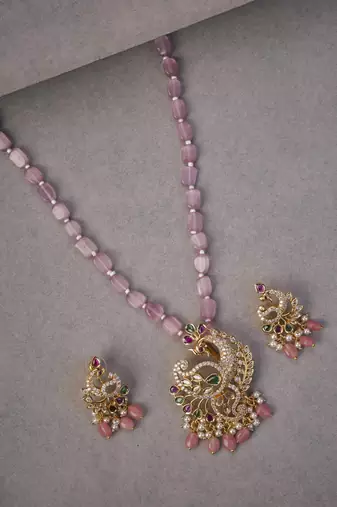 Elegant peacock gold plated locket set with earrings