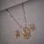 Elegant peacock gold plated locket set with earrings
