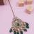 Gold plated traditional kundan pearl maang tikka for women and girls (t3153g) (green)