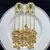 Kashmiri long ghungroo earrings, gold tone green statement earrings