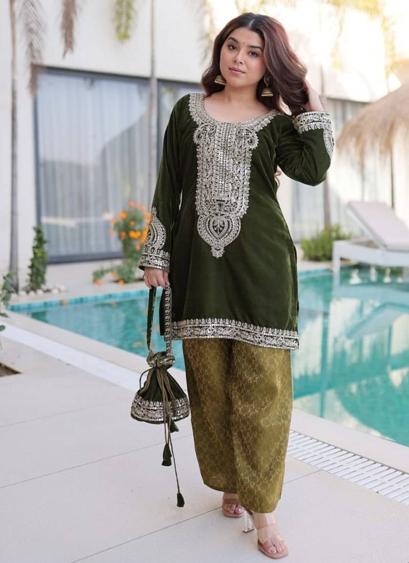 Green Embroidered velvet salwar suit