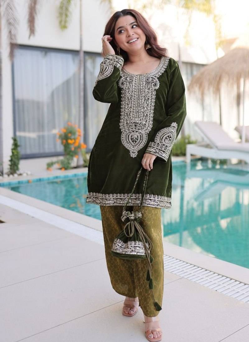 Green Embroidered velvet salwar suit