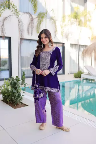 Purple Embroidered velvet salwar suit