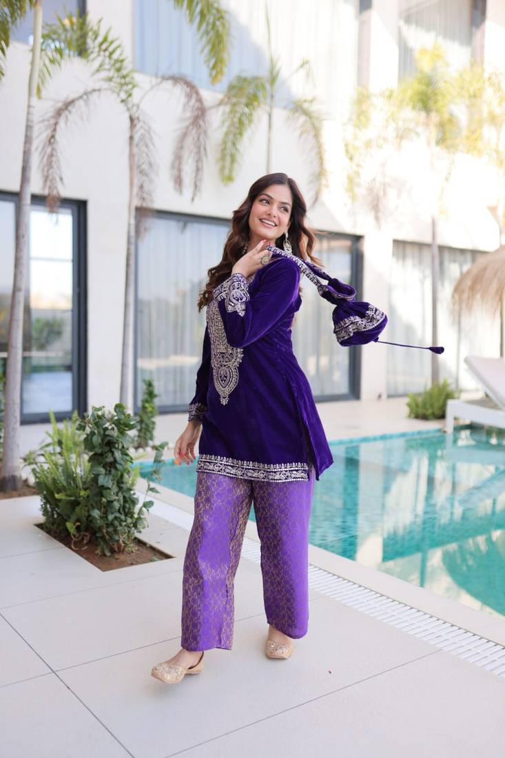 Purple Embroidered velvet salwar suit