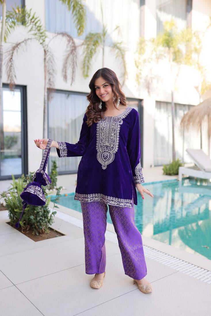 Purple Embroidered velvet salwar suit