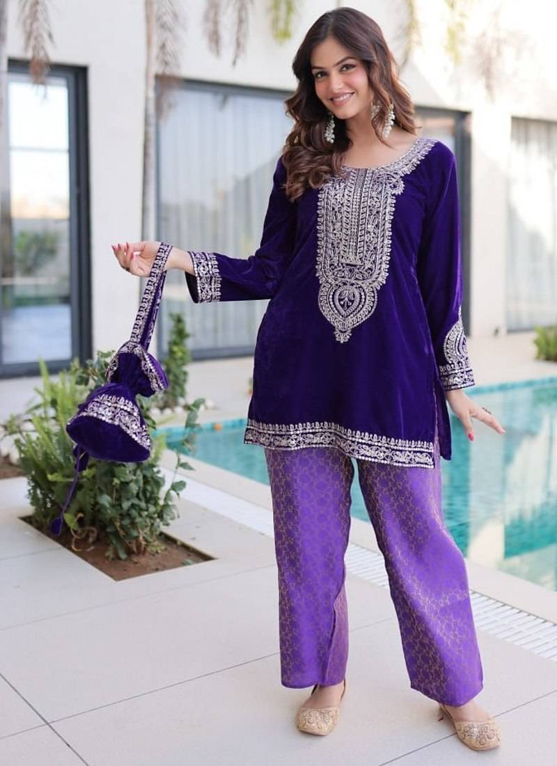 Purple Embroidered velvet salwar suit