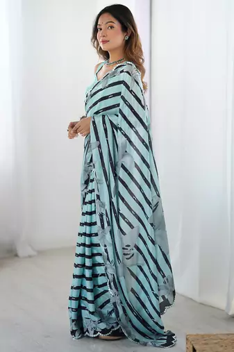 sky blue chinon silk blend print work with mirror work border designer saree