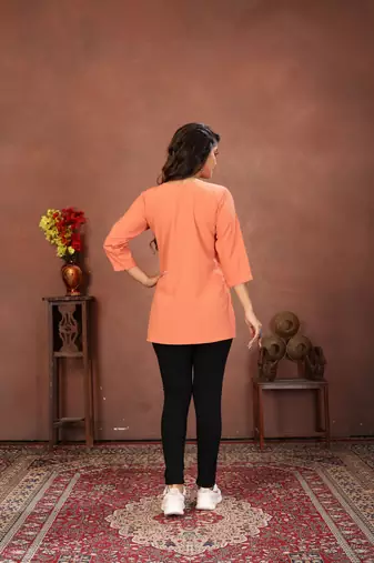 Peach rinkal cotton embroidered formal looking short kurta