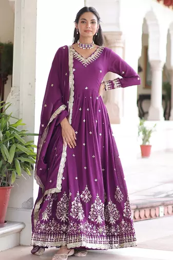 Magenta heavy embroidered ethnic gown with dupatta