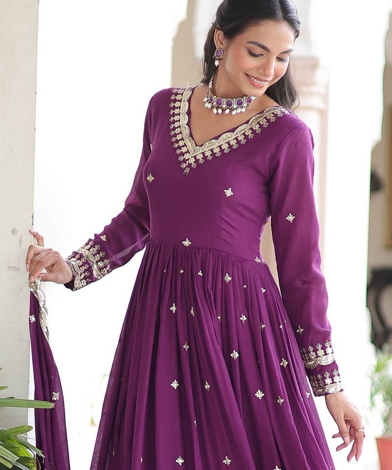 Magenta heavy embroidered ethnic gown with dupatta