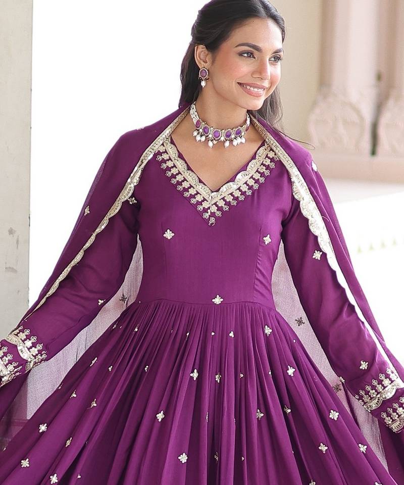 Magenta heavy embroidered ethnic gown with dupatta
