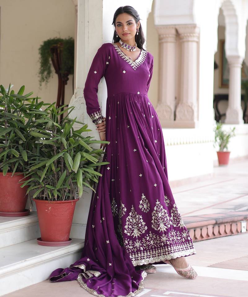 Magenta heavy embroidered ethnic gown with dupatta